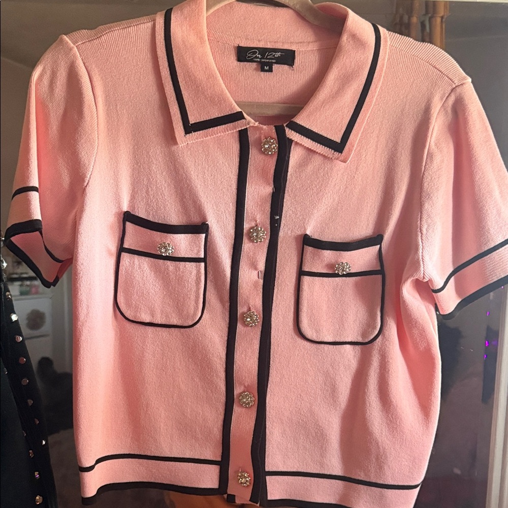 Elegant Pink Button-Down Shirt with Black Trim